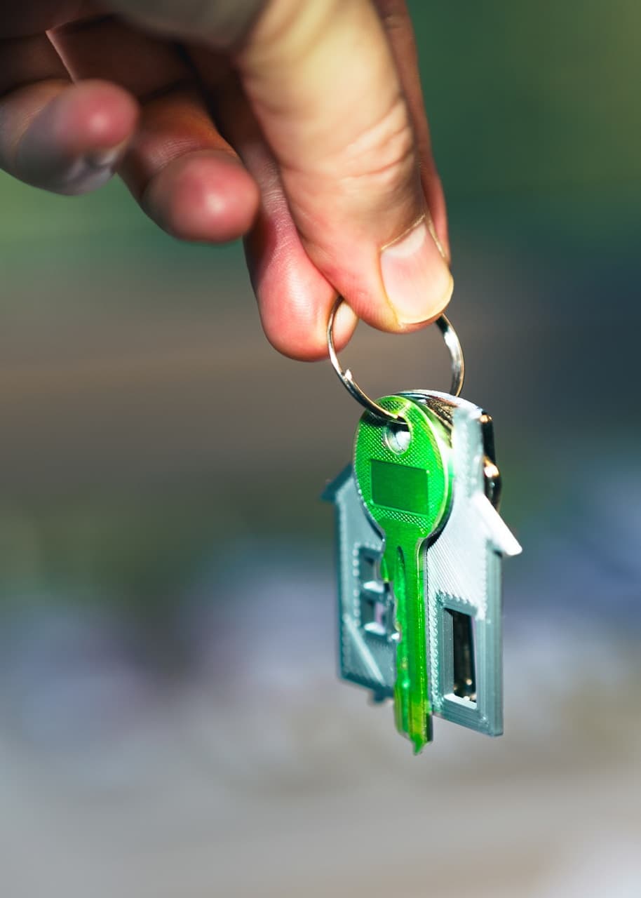 Rental manager presenting a residence key