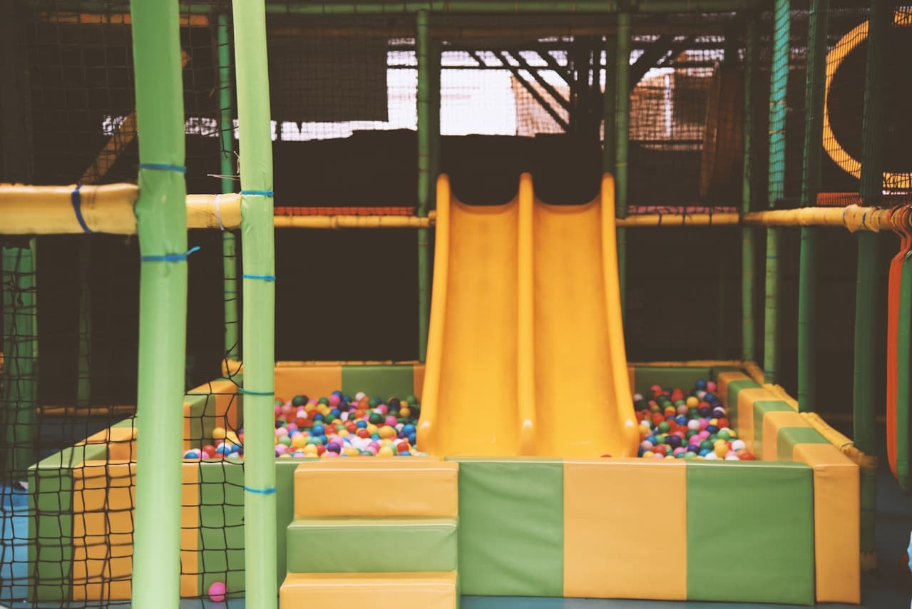 Kids area with playful tree-house installation
