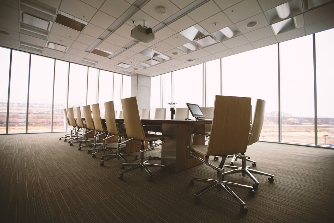 Executive meeting room with long boardroom table